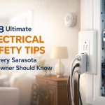A residential GFCI outlet and open electrical panel inside a Sarasota home, illustrating essential electrical safety tips for homeowners to prevent hazards and improve home safety.