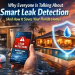 Venice Florida home with water leaks showing how smart leak detection can be used to pinpoint the leak. phone with leak detection program and plumbing graphics